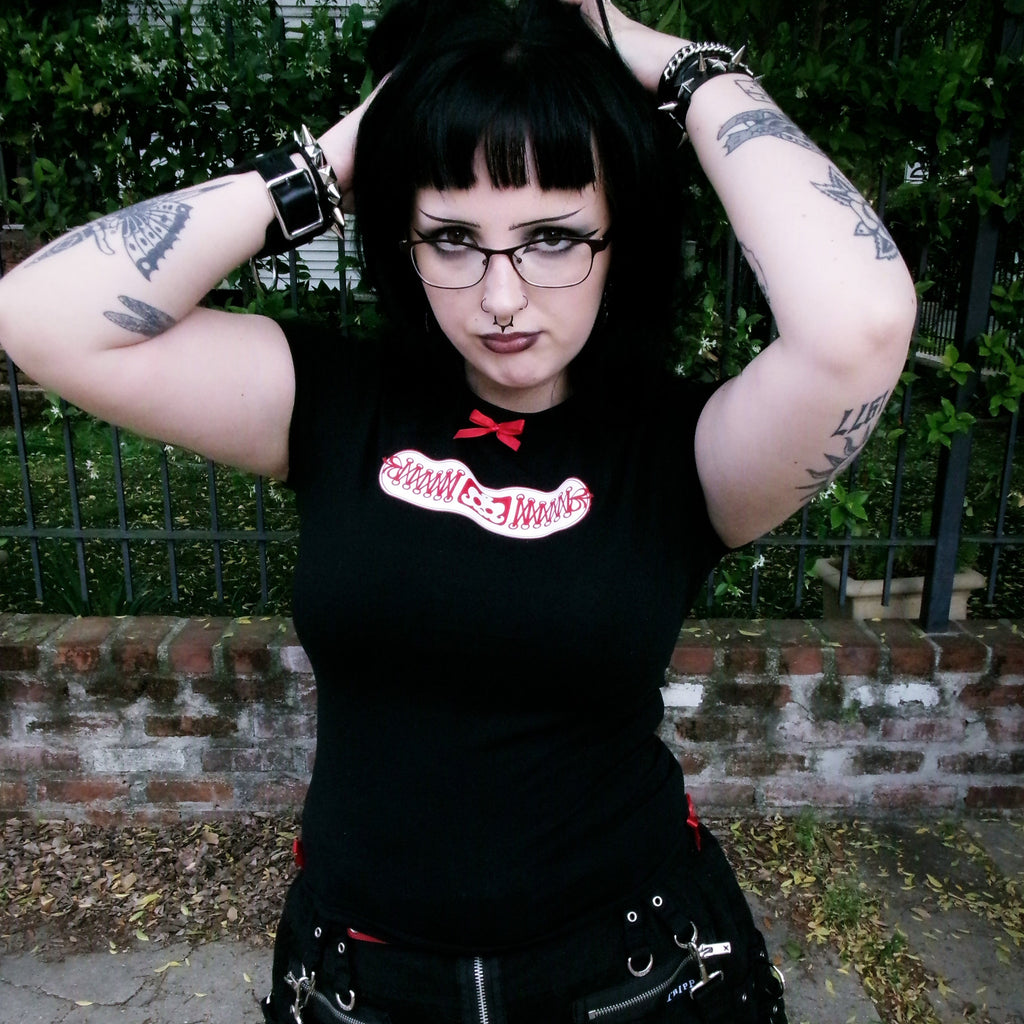 ouchie! black baby tee