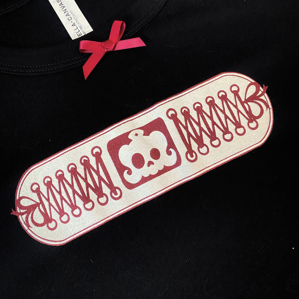ouchie! black baby tee